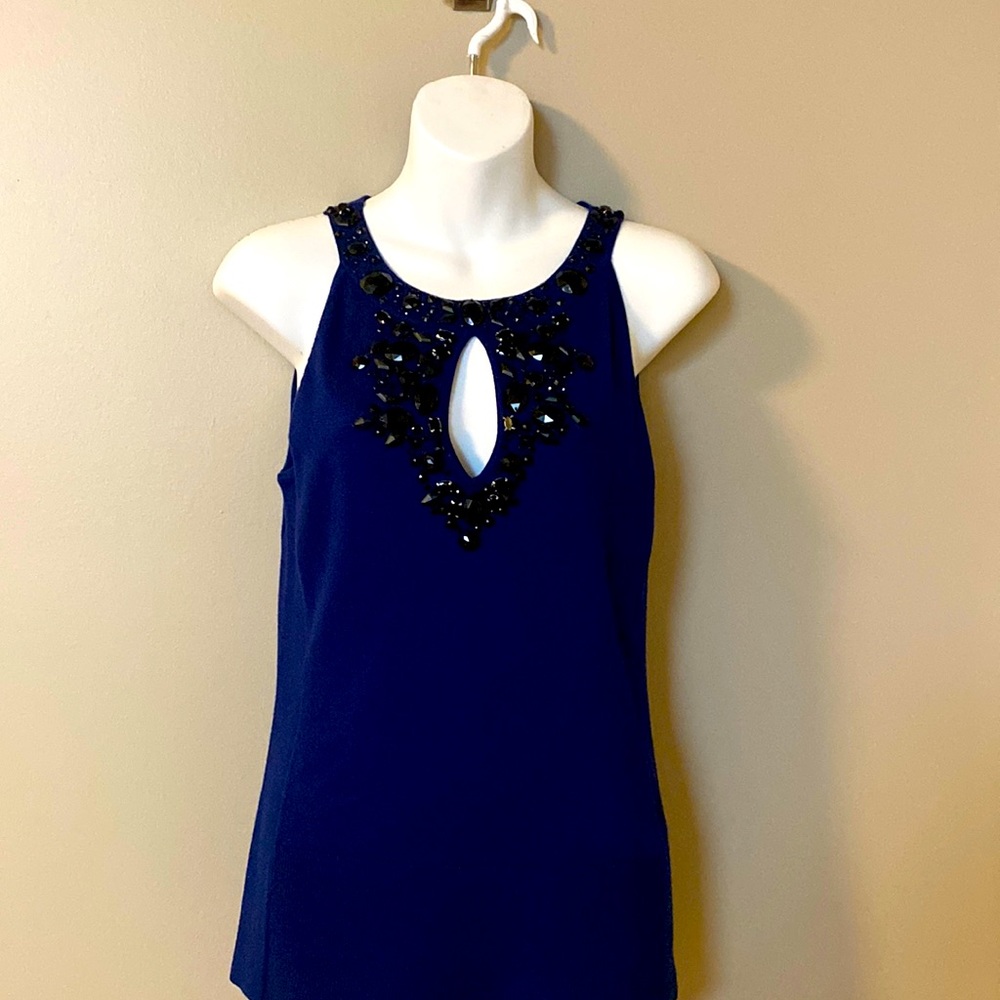 Blue sleeveless knit top with sequin detail